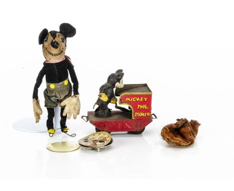 A Dean's Rag Book Co Mickey Mouse,  with boot button eyes and blue velvet shorts --5 ½in. (14cm.) high (missing shoes); a Ste