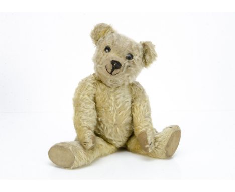 An early Chad Valley Aerolite teddy bear 1920s,  with blonde mohair, unusual flat black boot button eyes, pronounced clipped 