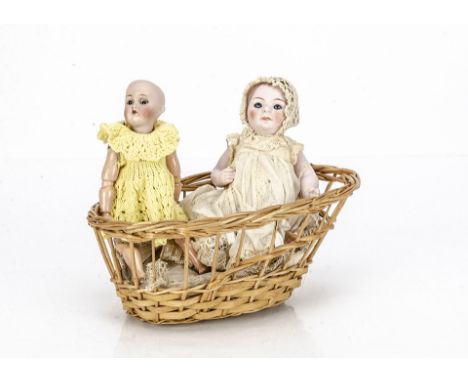 A small Simon &amp; Halbig for Kämmer &amp; Reinhardt child doll,  with brown sleeping eyes, jointed composition body and kni