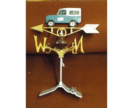 A Cast Metal Weather Vane with Land Rover Motif (item 51, plus VAT)