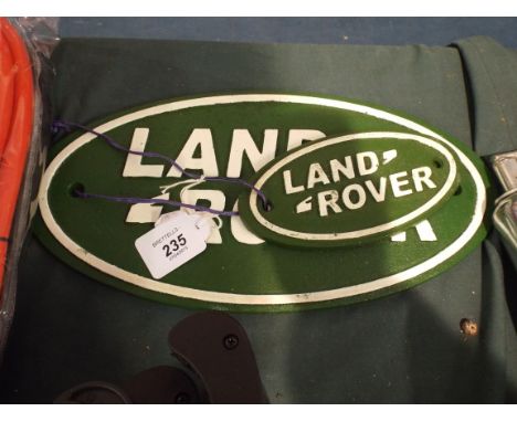 Two Oval Land Rover Plaques (item 54, plus VAT)