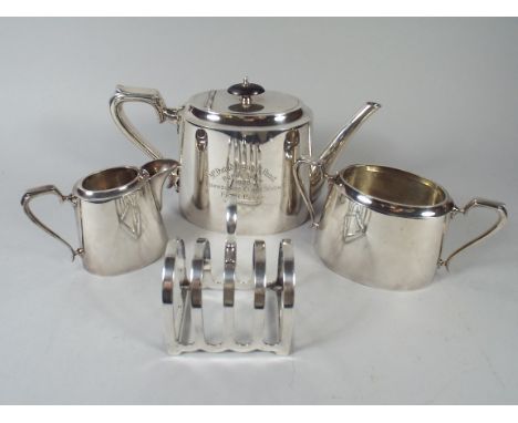 A Silver Plated Three Piece Presentation Tea Service for the David Davies Hunt Puppy Show, 1928 together with A Toast Rack 