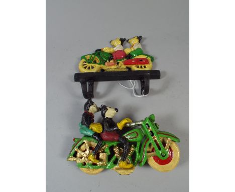 A Cast Metal Mickey Mouse Coat Hook and Motorbike Model (item 46, plus VAT)