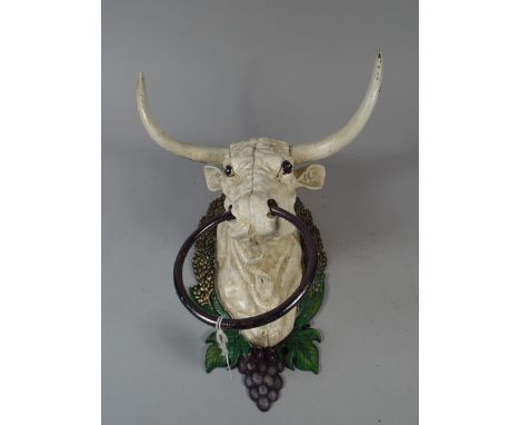 A Hand Painted Cast Metal Ring Tie in the Form of A Cows Head (item 32, plus VAT)