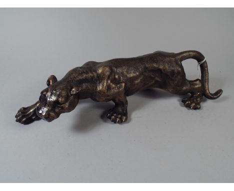 A Bronze Effect Cast Metal Study of A Lioness (item 42, plus VAT) 