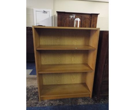 A Light Oak Adjustable Shelf Bookcase 