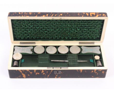 A fine tortoiseshell rectangular sewing box by Lund, circa 1850, the lid interior in ruched green silk, over a green silk lid