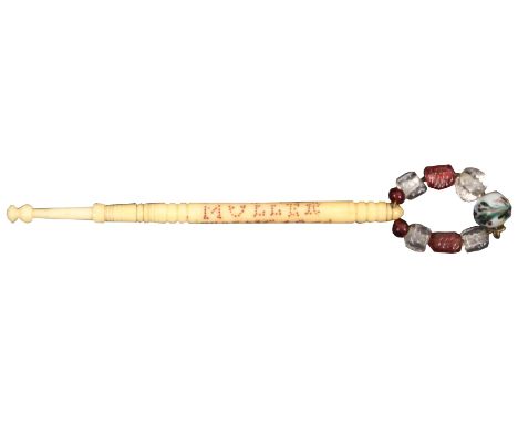 A 19th Century bone hanging bobbin inscribed Franz Muller Hung 1864