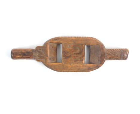 An unusual late 18th Century fruitwood knitting stick, possibly Welsh, dated 1791 and initialled WS with two slots to take a 
