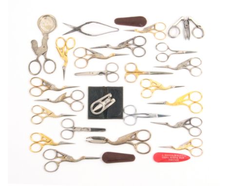 A quantity of scissors, comprising three folding pairs, one in leather case, together with a collection of modern and old sto