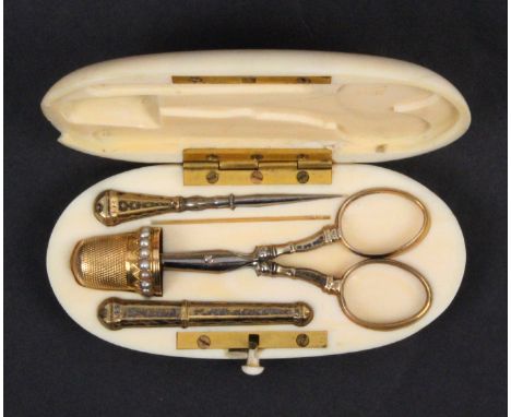 A late 19th Century French etui in ivory of oval form, the flush fitted interior with silver gilt fittings comprising a stile