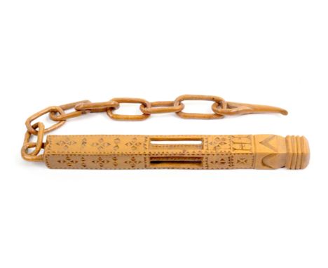 A fine 18th Century boxwood chained knitting stick, English, of square section with geometric chip carved decoration with a p