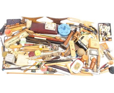 A large mixed lot – sewing – comprising hussifs, large wooden winders, knitting stick cylinders, modern thimbles and other pi