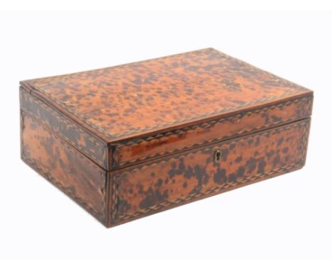 An Anglo Indian tortoiseshell and inlaid rectangular sewing box, circa 1840, with borders of light and dark wood diamonds, th