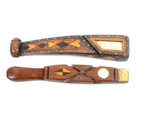 Two 19th Century knitting sticks, comprising a mahogany carved scroll example, Durham, inlaid with hearts and diamonds within