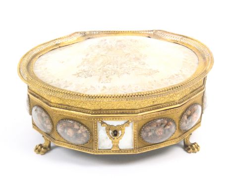 A fine Palais Royal mother of pearl and gilt metal sewing box, circa 1820, the contents complete, of scallop form the lid wit