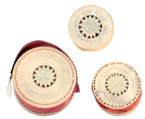 A fine three piece sewing set in mother of pearl, comprising pincushion, emery and waxer, each of pierced disc form and initi