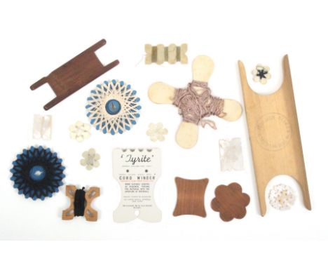 Sixteen silk and other winders comprising three crude bone snowflakes, 2.5cm, a bone multiple, 5cm, three pearl examples, thr
