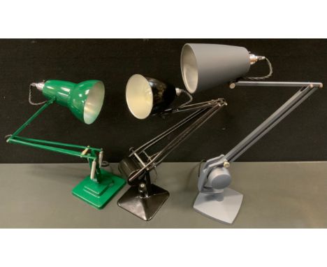 A Herbert Terry green angle poise lamp, signed, others later (3) 