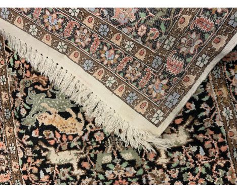 A hand-made, silk and wool mix, Kashan rug / carpet, 174cm x 91cm. 