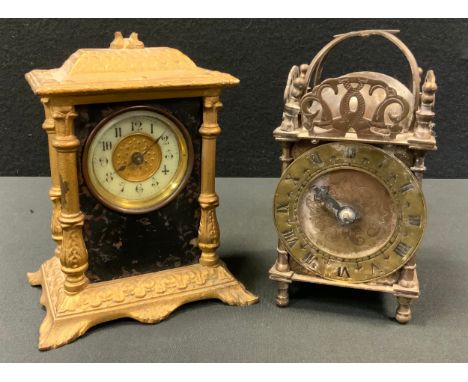 A British United Clock Co gilt metal and cast iron marble effect carriage clock, 15cm high;  a quartz lantern clock (2) 