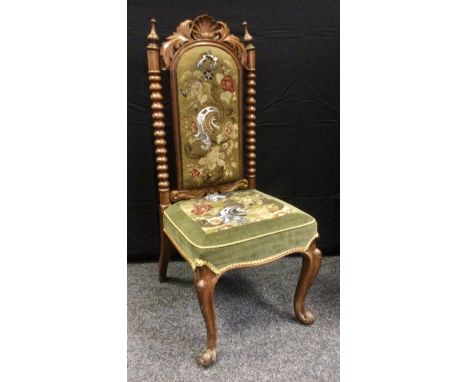 A Victorian walnut side chair, anthemion cresting, arched beaded and tapestry back and stuffed-over seat, turned free standin
