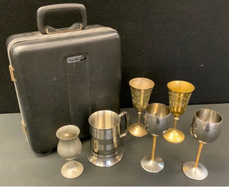 A pair of Viners Stuart Devlin designed stainless steel and gilt metal goblets;  Easy Wear four person travel bar etc 