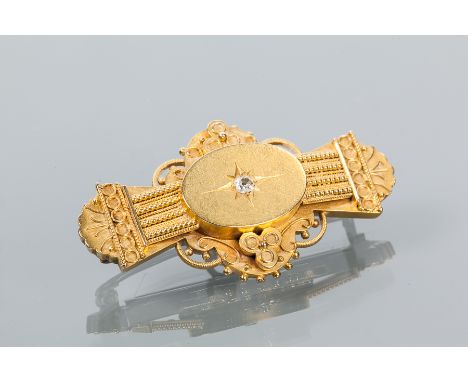 VICTORIAN DIAMOND BAR BROOCH
with a central old cushion cut diamond in a star setting, marked 15ct for fifteen carat gold on 