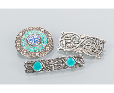 THREE CELTIC INFLUENCE SILVER BROOCHES
including a scrolling foliate brooch made by Alexander Ritchie for Iona Celtic Art dat
