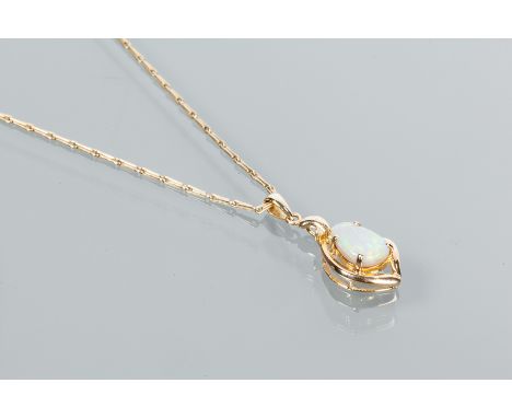 OPAL AND DIAMOND PENDANT
set with a pear shaped cabochon opal doublet, the mount set with a small brilliant cut diamond, in f