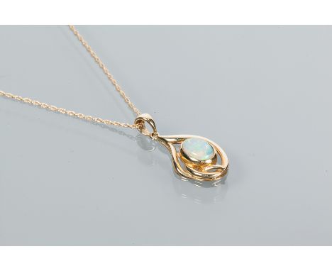 OPAL PENDANT
with an oval cabochon opal, in nine carat gold setting, on a nine carat gold chain