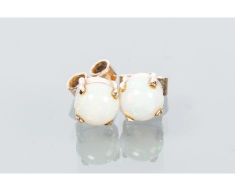 ROUND OPAL STUD EARRINGS
each set with a round cabochon cut opal, marked for nine carat gold.