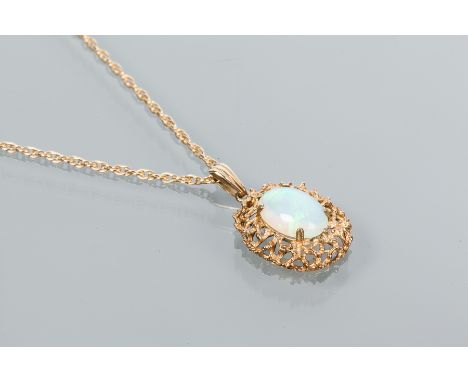 LARGE OPAL PENDANT
with an oval cabochon cut opal approximately 12mm x 9mm, in unmarked setting, on an unmarked chain