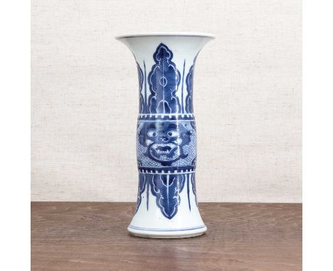 A Chinese blue and white gu vase,Kangxi (1662-1722), of cylindrical form rising from an everted foot to a slightly bulbous mi