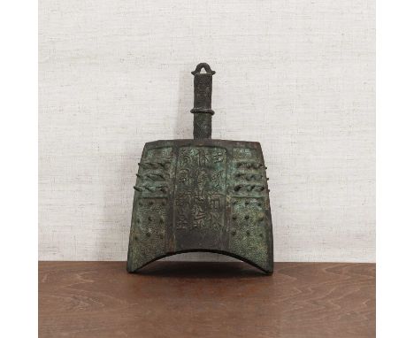 A Chinese bronze bell, yongzhong,possibly Qing dynasty, of archaic form, with an upper section decorated with protruding stud