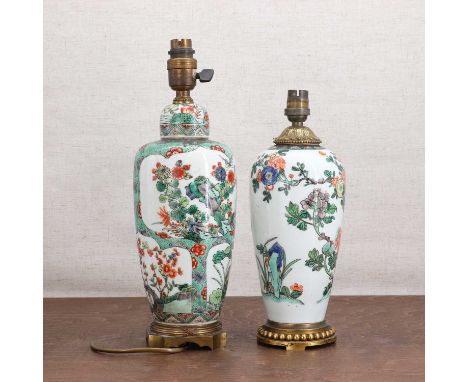Two Chinese wucai vases,Kangxi (1662-1722), comprising:one of tapering form, painted with peony, chrysanthemum, lotus and pru