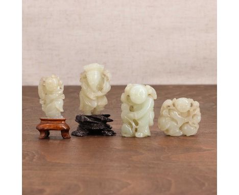 A collection of four Chinese jade figures,Qing dynasty (1644-1911), comprising:one of Liu Hai, carrying a lingzhi branch, wit