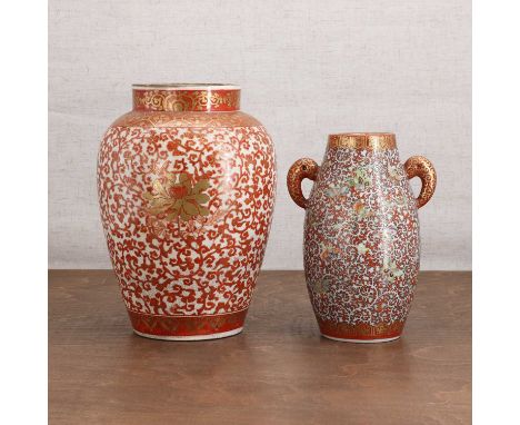 A Japanese Kutani ware vase,20th century, of ovoid form, flanked by two handles, painted with butterflies amongst scrolls in 