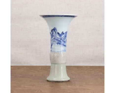 A Chinese blue and white gu vase,Kangxi (1662-1722), of slender elongated form, rising from an everted foot to a slightly bul