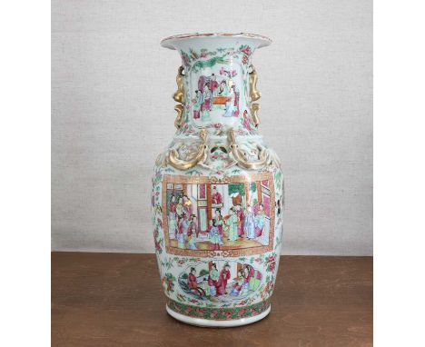 A Chinese Canton famille rose vase,19th century, of baluster form applied with Buddhist lion handles and chilong to the shoul