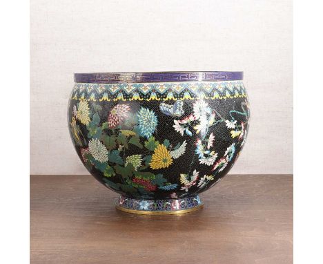 A Chinese cloisonné jardinière,20th century, of tapering form, enamelled with chrysanthemums, peony and prunus blossoms again