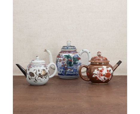 A Chinese café au lait teapot,Kangxi (1662-1722), of globular form painted with peony in iron-red and gilt, the domed cover s