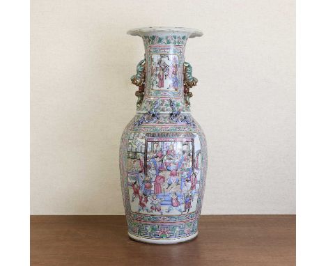 A large Chinese Canton famille rose vase,19th century, the ovoid body rising to a lobed flared rim, applied with Buddhist lio