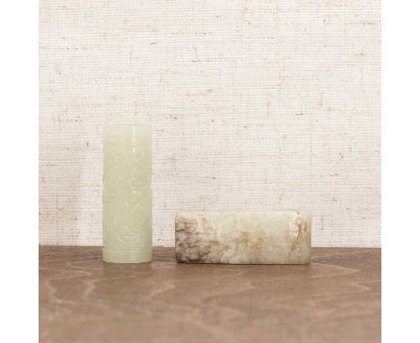 A Chinese jade scabbard,20th century, carved with scrolls,5cm long, anda jade lingguan pendant,carved with literati under a p