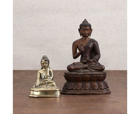 A Chinese bronze Buddha,seated cross-legged on a double lotus platform, his hands in Vitarka mudra,17.5cm high, anda smaller 