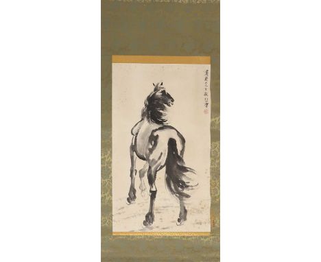 A Chinese hanging scroll,20th century, in the style of Xu Beihong (1895-1953), painted with a horse, inscribed with a dedicat