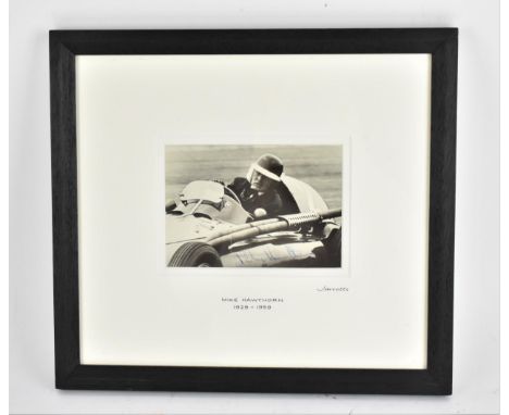 A signed reprinted photograph of Mike Hawthorne 1929-1959, racing in a Ferrari, printed with the original negative, Jarrotts,