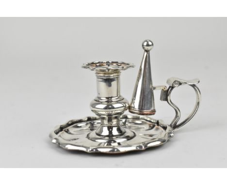 A 19th century Sheffield plate camber candlestick and snuffer of small proportions with shaped edges, 5cm highLocation: