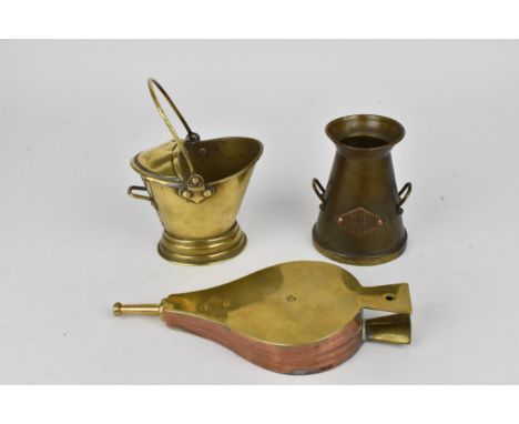 Victorian novelty brass sugar bowl in the shape of a miniature coal scuttle, with swing handle, circa 1890, together with a V