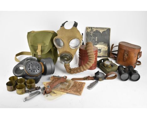 British Military interest - a group of WWII and later items to include gas masks, compass, 1950s knives and whistle, a 1941 a